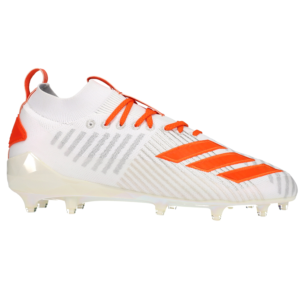orange and white football cleats